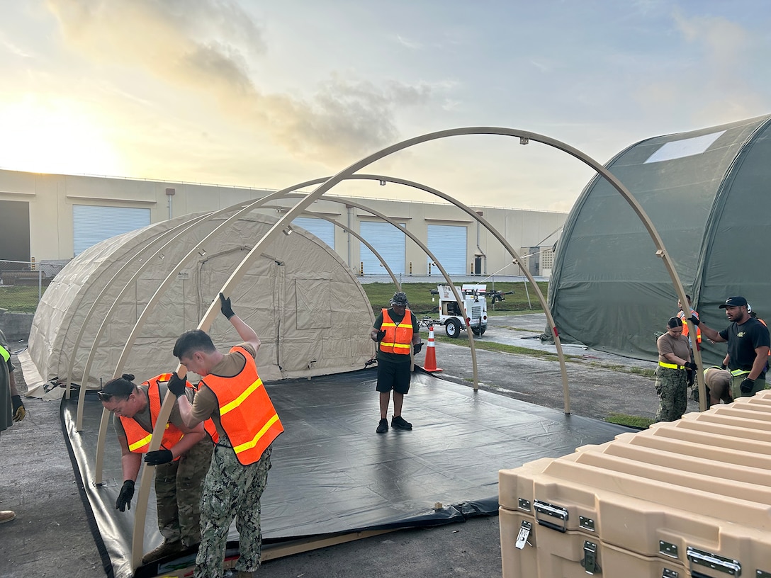 Workers build a defense shelter