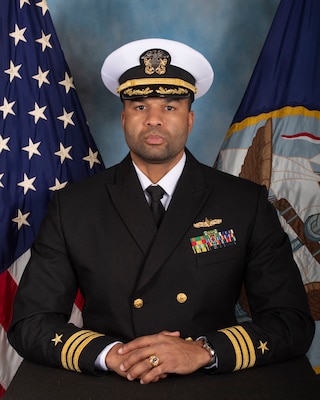 Commander Curtis Sharp