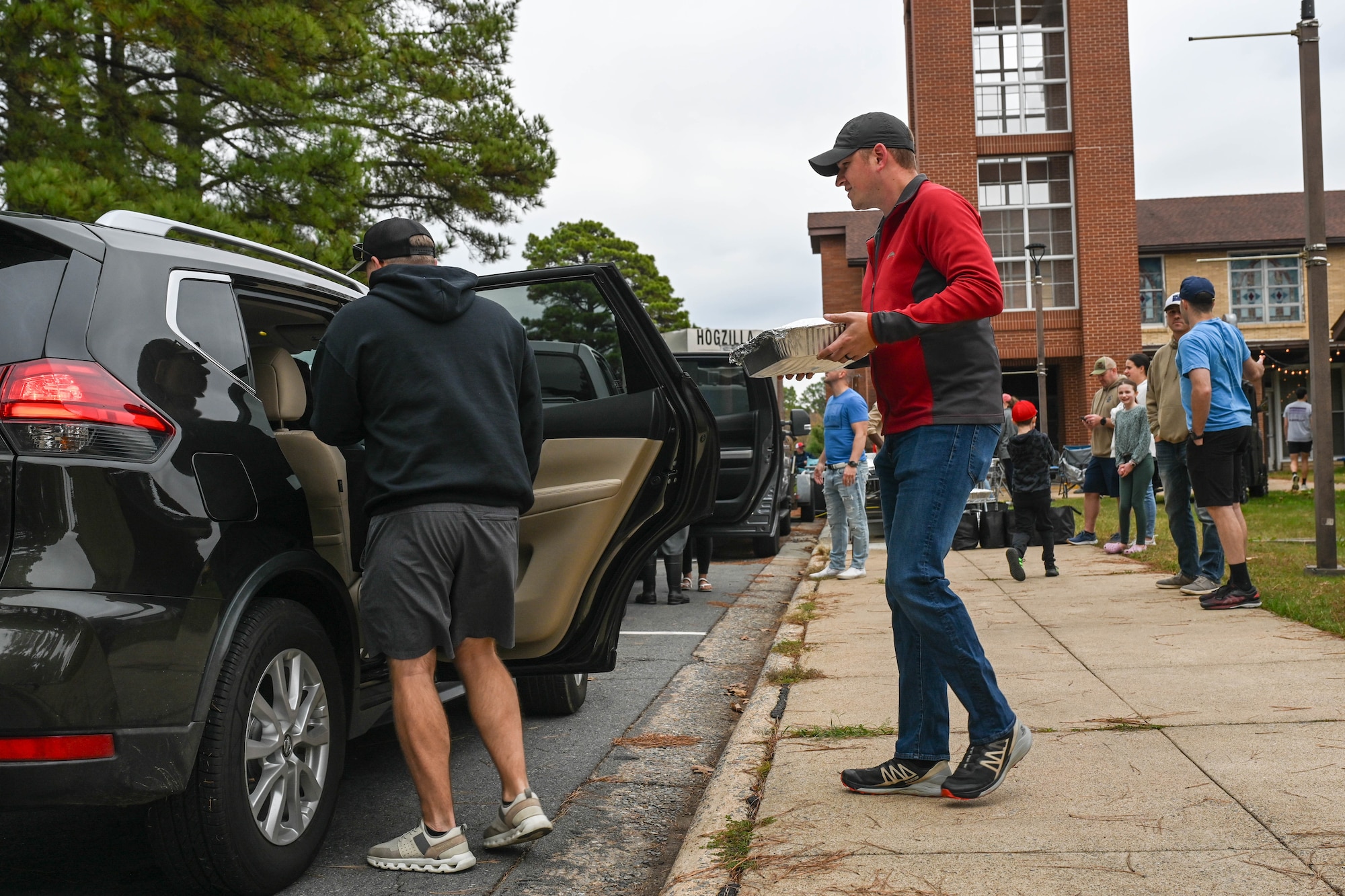 People deliver smoked turkeys.