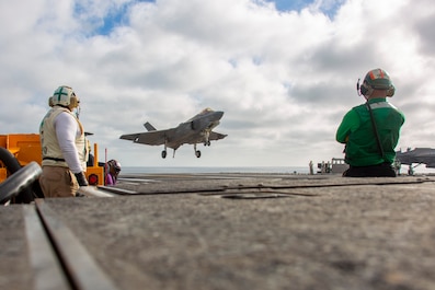 PACIFIC OCEAN (Nov. 23, 2025) — An F-35C Lightning II, attached to Marine Fighter Attack Squadron (VMFA) 314, prepares to make an arrested landing on the flight deck of Nimitz-class aircraft carrier USS Abraham Lincoln (CVN 72) on Nov. 23, 2025. USS...
