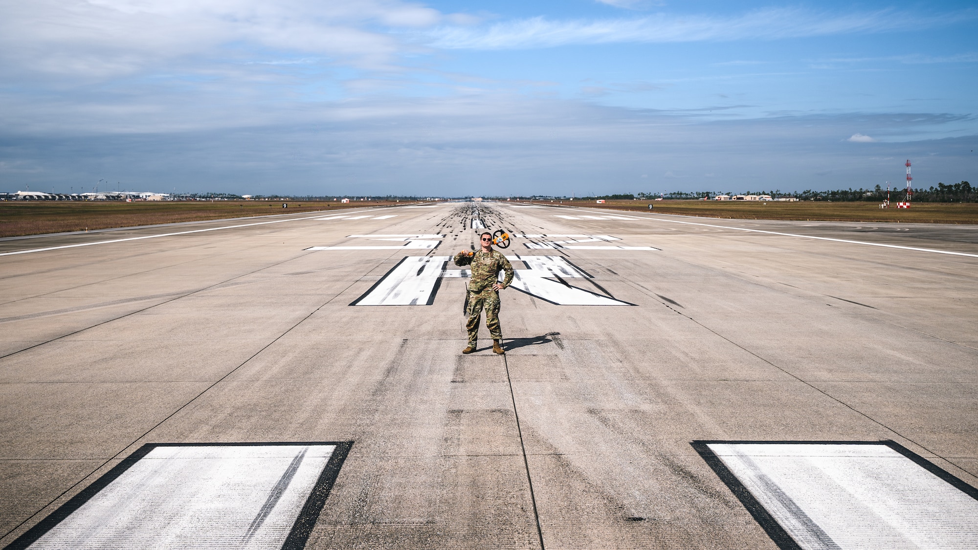 Airman poses for photo