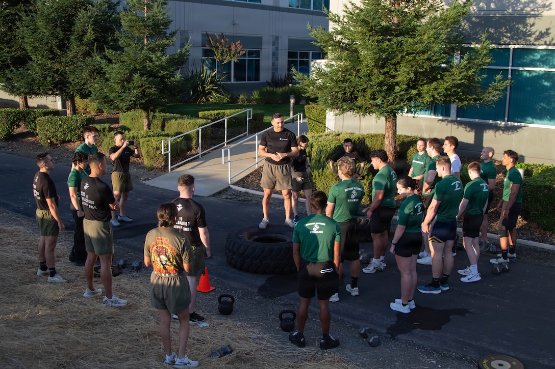 U.S. Marines Corps Master Sgt. Renzo Retanaulcigari, an assistant recruiting instructor with Recruiting Station Sacramento, leads a physical training session in Sacramento, California, October 10, 2025. Marine Corps physical training is crucial to ensure combat readiness by developing the physical and mental toughness needed for the rigors of combat. It optimizes performance, builds self-confidence, and enhances organizational discipline, morale, and esprit de corps. (U.S. Marine Corps photo by Staff Sgt. Ryan Harvey)