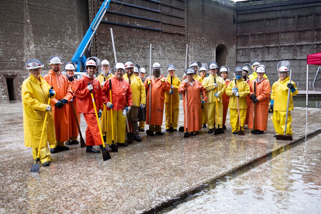 21 Seattle District teammates headed deep into the filling tunnels of the large lock chamber at the Hiram M. Chittenden Locks for the annual barnacle scraping. Each year, juvenile salmon make their way through the Locks on their journey to Puget Sound, and the sharp barnacles along the tunnels can injure passing fish—including ESA-listed salmonids like Chinook and steelhead.
