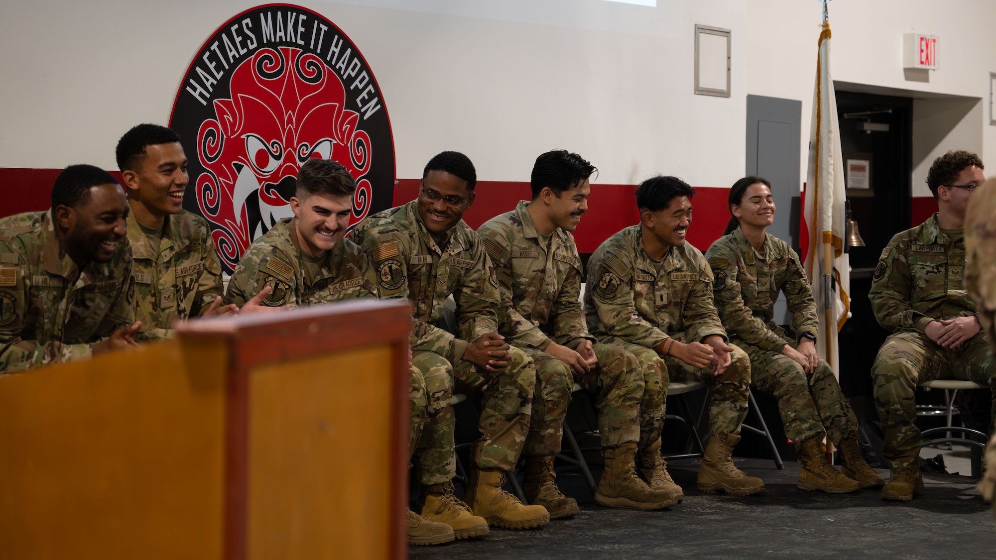 U.S. Air Force Airmen assigned to the 51st Civil Engineer Squadron share a moment together during the Haetae Leadership Academy at Osan Air Base, Republic of Korea, Nov. 21, 2025. The course highlighted how every squadron contributes to combat airpower, giving participants a clearer view of the processes that keep Osan mission-ready. (U.S. Air Force photo by Senior Airman Tallon Bratton)