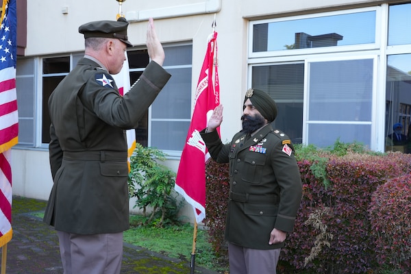 U.S. Army Corps of Engineers – Japan Engineer District (USACE JED) Commander, Col. Patrick Biggs, left, administers the oath of office to newly promoted Lt. Col. Simratpal “Simmer” Singh, JED’s deputy commander, during his promotion ceremony at the District’s headquarters on Camp Zama, Japan, Nov. 26th, 2025