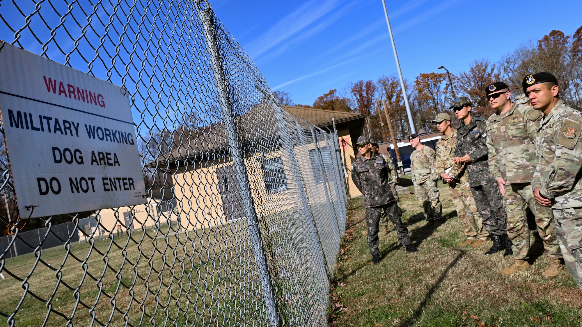 U.S. Air Force and Republic of Korea Air Force military police leadership watch a 316th Security Forces Group military working dog demonstration at Joint Base Andrews, Maryland.