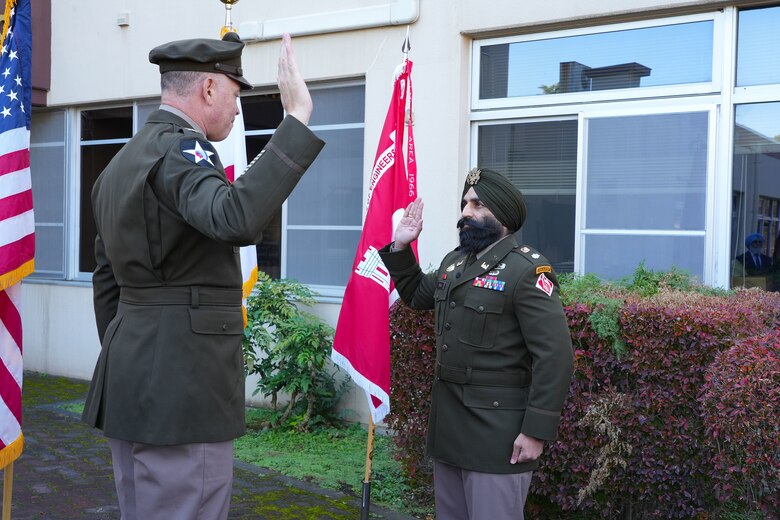 U.S. Army Corps of Engineers – Japan Engineer District (USACE JED) Commander, Col. Patrick Biggs, left, administers the oath of office to newly promoted Lt. Col. Simratpal “Simmer” Singh, JED’s deputy commander, during his promotion ceremony at the District’s headquarters on Camp Zama, Japan, Nov. 26th, 2025