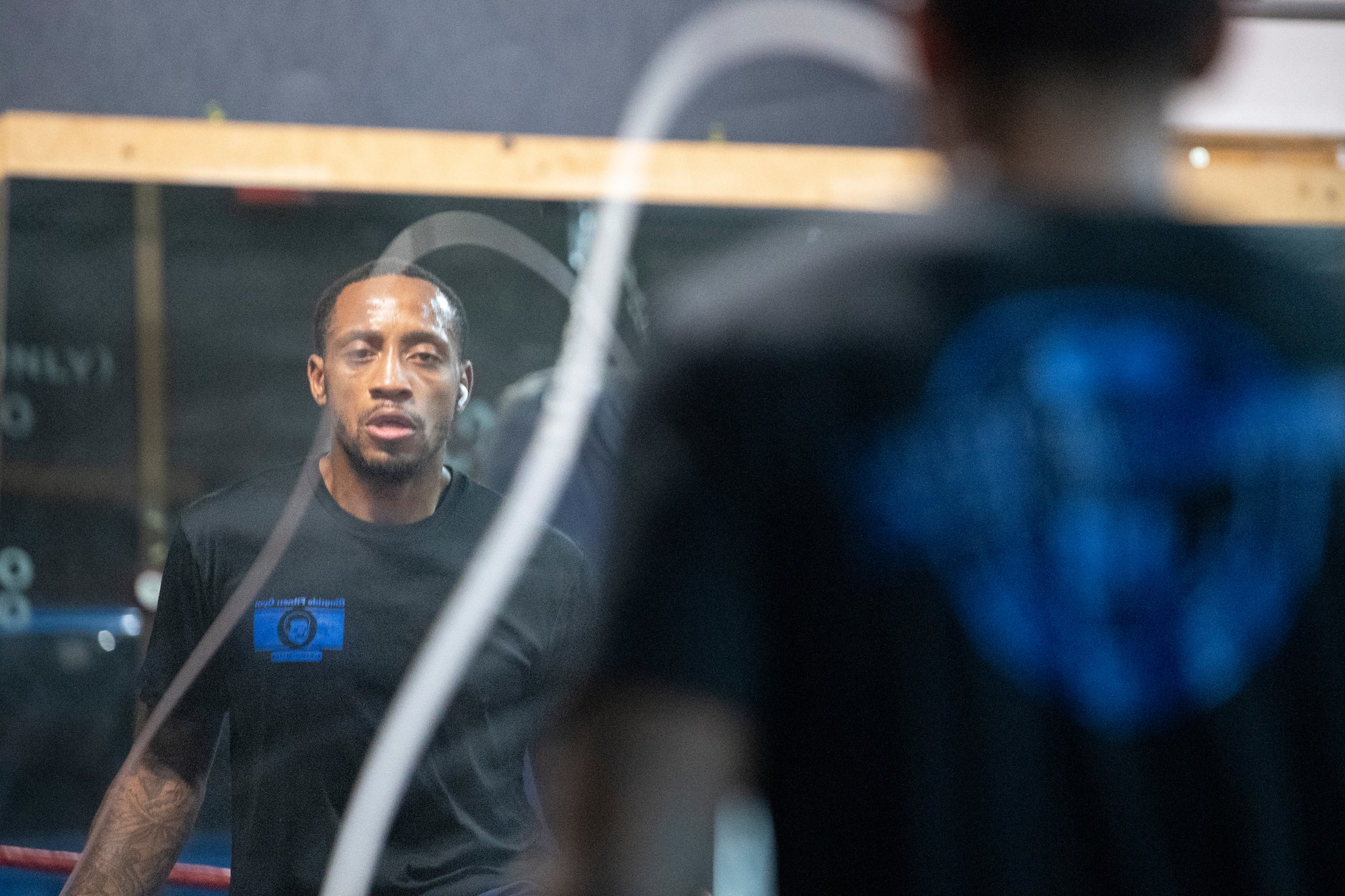 U.S. Air Force Senior Airman Craig Jeudy, Fifth Air Force technical support technician, jumps rope during a training session.
