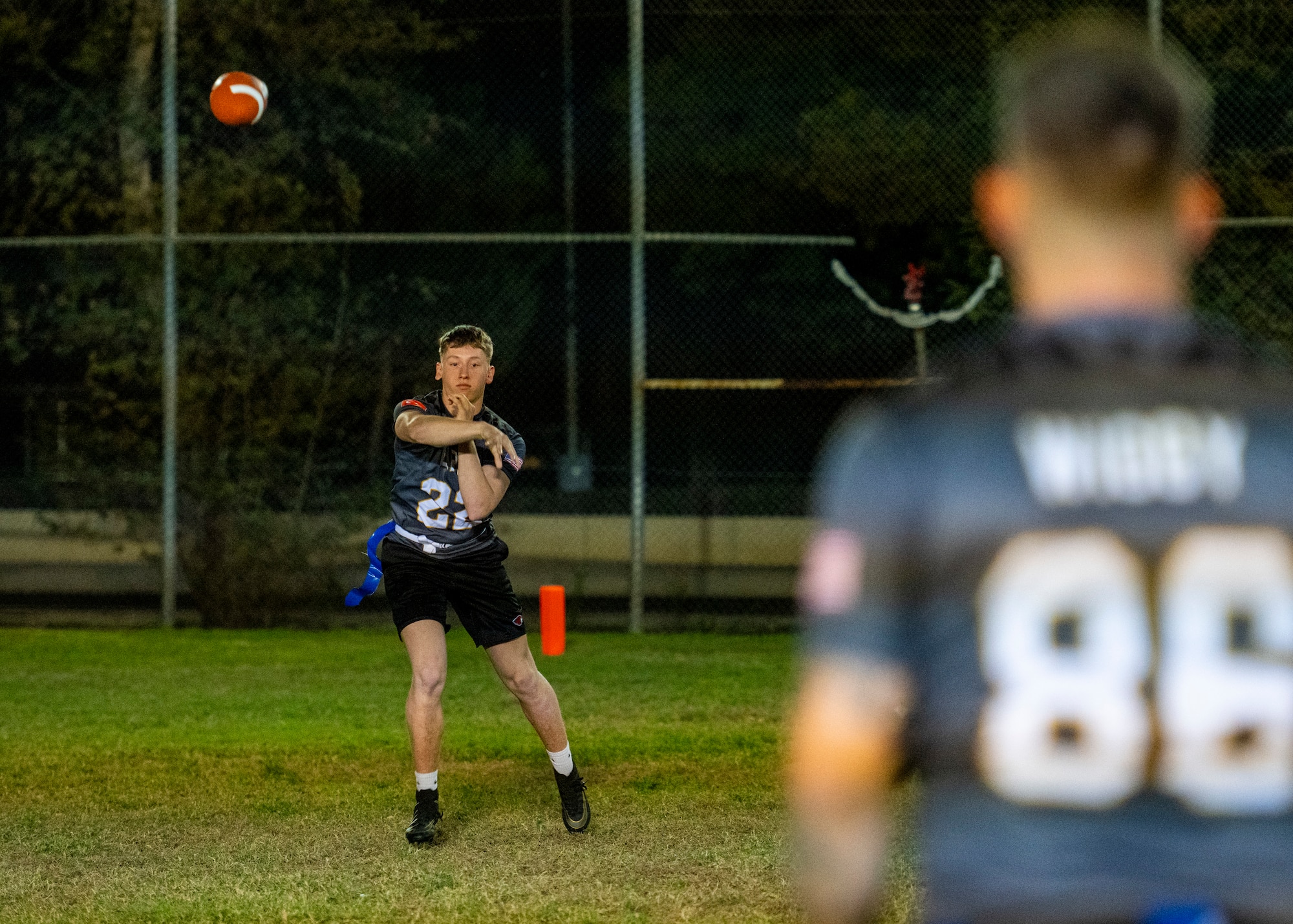Airmen compete in an intramural flag football game