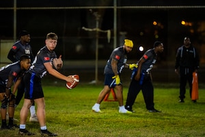 Airmen compete in an intramural flag football game