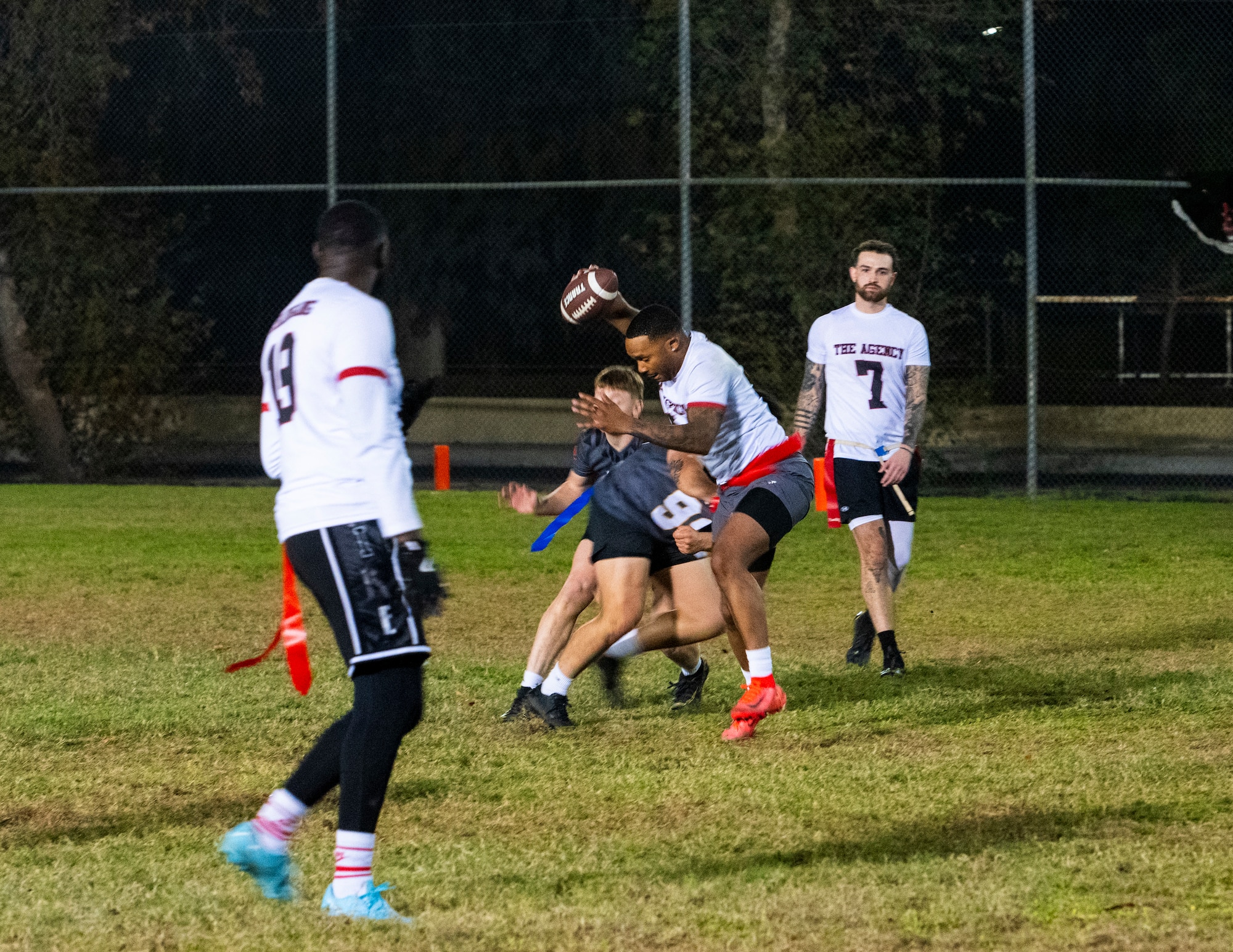 U.S. Airmen compete in an intramural flag football game