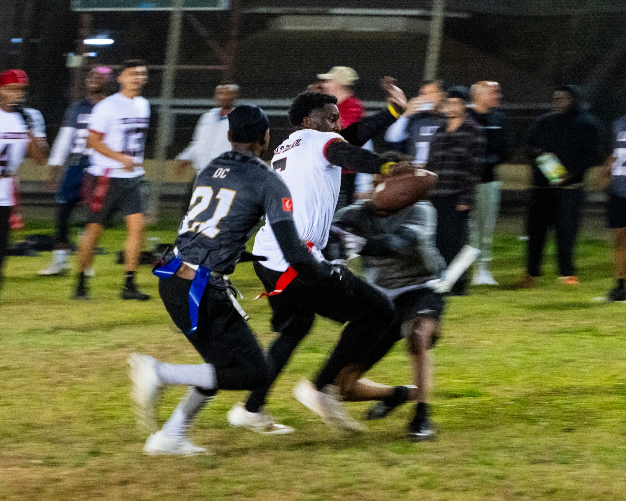 U.S. Airmen compete in an intramural flag football game