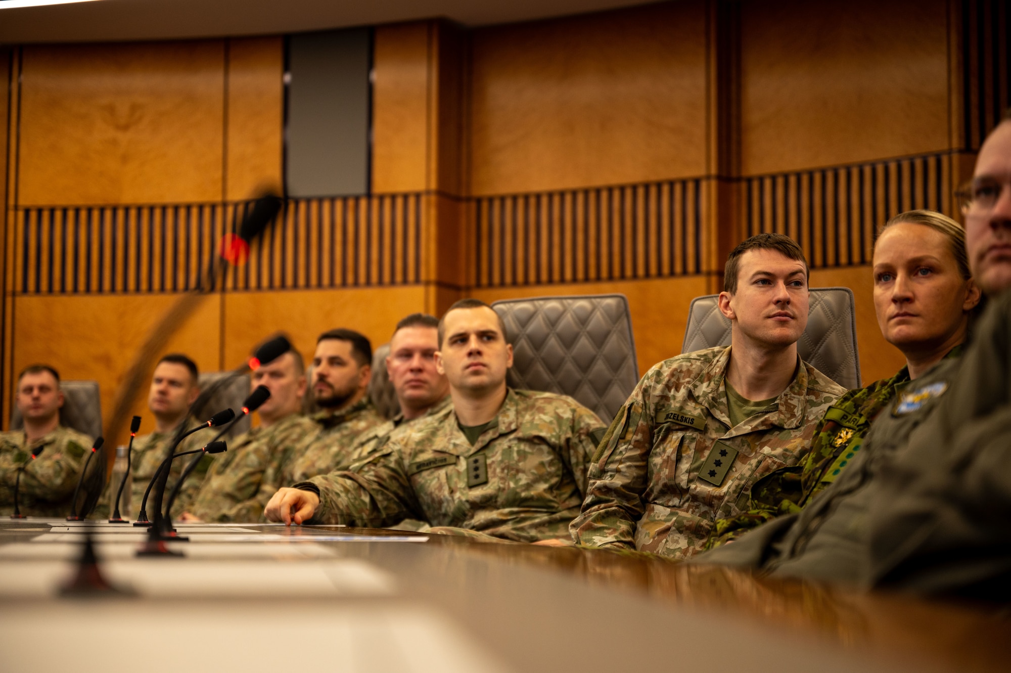 Baltic nation service members listen to a brief at the U.S. Air Forces in Europe - Air Forces Africa Headquarters at Ramstein Air Base, Germany, Nov. 25, 2025.