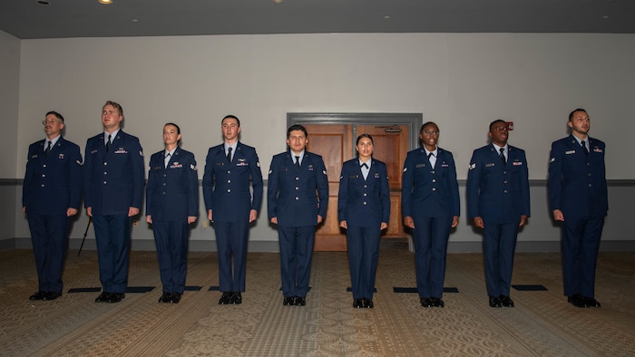 A photo of Airmen reciting the Honor Guard Creed.