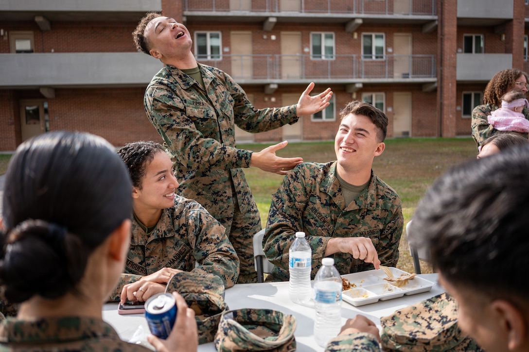 U.S. Marines with Marine Wing Headquarters Squadron (MWHS) 2, 2nd Marine Aircraft Wing, enjoy Bricksgiving at the MWHS-2 barracks on Marine Corps Air Station Cherry Point, North Carolina, Nov. 20, 2025. Bricksgiving is an annual Thanksgiving-style celebration led by MWHS-2 that builds unit cohesion and camaraderie during the holiday season. (U.S. Marine Corps photo by Staff Sgt. Maximiliano Rosas)