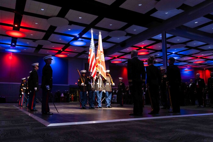 U.S. Marines with 2nd Marine Logistics Group march on the colors during the 2nd MLG 250th Birthday Ball ceremony in Greenville, North Carolina, Nov. 2, 2025. The Marine Corps birthday ceremony honors the history, legacy and traditions passed down from generation to generation since the founding of the Corps on Nov. 10, 1775. (U.S. Marine Corps photo by Staff Sgt. Gavin Umboh)