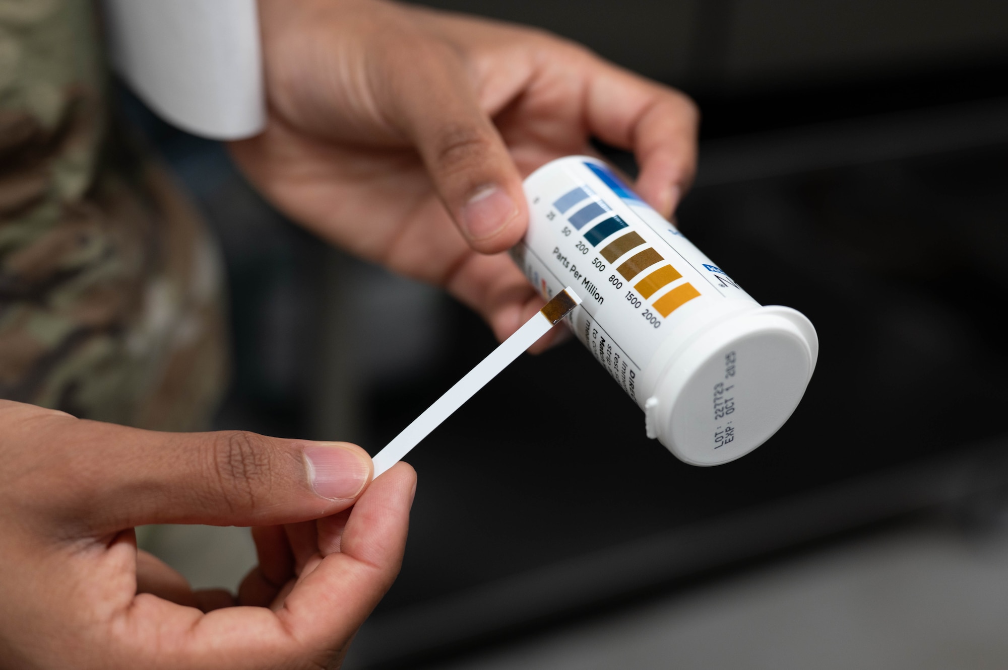 U.S. Air Force Airman Abdulhayy Al-Sharif, 325th Operational Medical Readiness Squadron public health technician, tests a disinfectant solution during a routine food safety inspection at the dining facility on Tyndall Air Force Base.