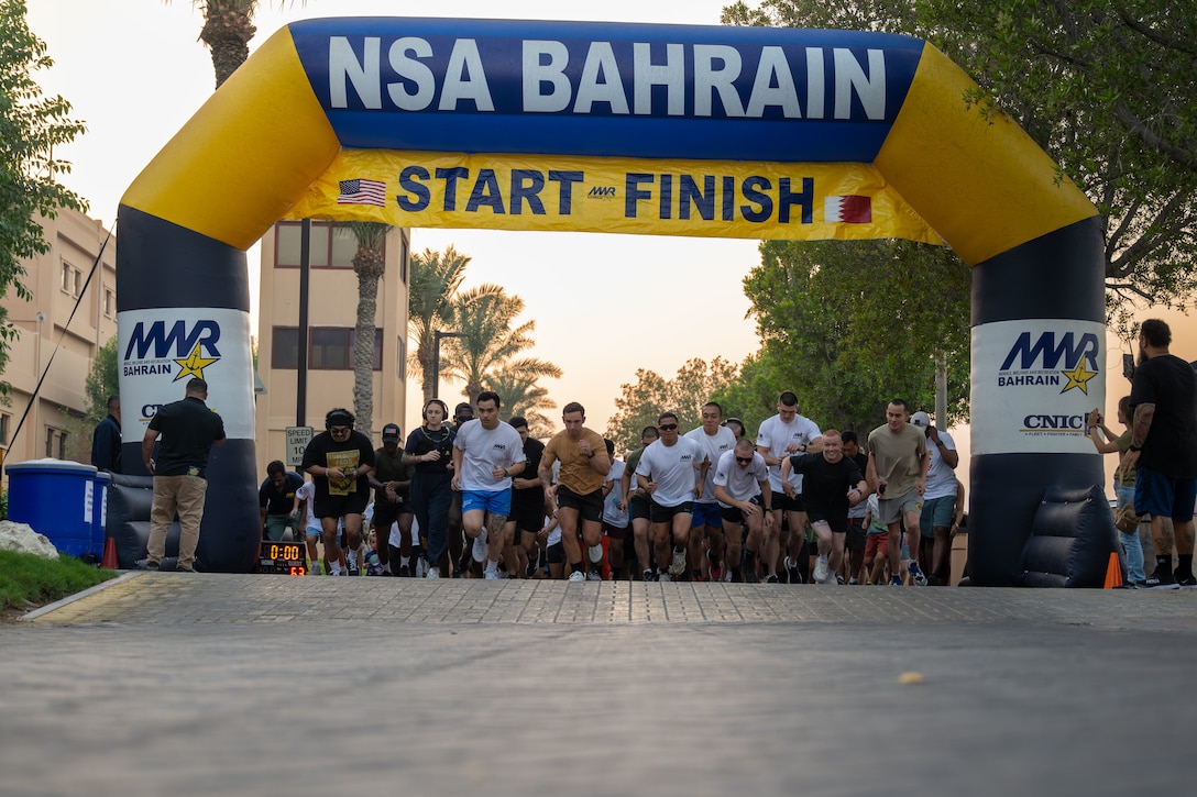 MANAMA, Bahrain (Nov. 23, 2025) Naval Support Activity Bahrain personnel participate in the annual Morale, Welfare, and Recreation Turkey Trot, a 5km run/3k walk around the base, in the U.S. Central Command area of responsibility. NSA Bahrain enables the forward operations and responsiveness of U.S. and allied forces in support of the Navy Region Europe, Africa, Central mission to provide services to the fleet, warfighter and family. (U.S. Navy photo by Mass Communication Specialist 2nd Class Iain Page)
