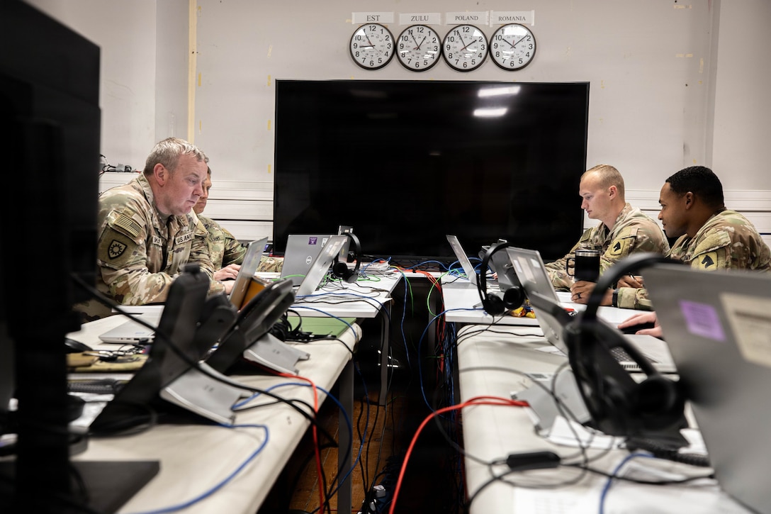 U.S. Army Kentucky National Guard Soldiers review Fire support plans from the 52nd Air Defense Artillery Brigade in the “FIRES cell”, the tactical hub for precision lethality during Avenger Triad 25, Oct. 30, 2025, Camp Kosciuszko, Poland.