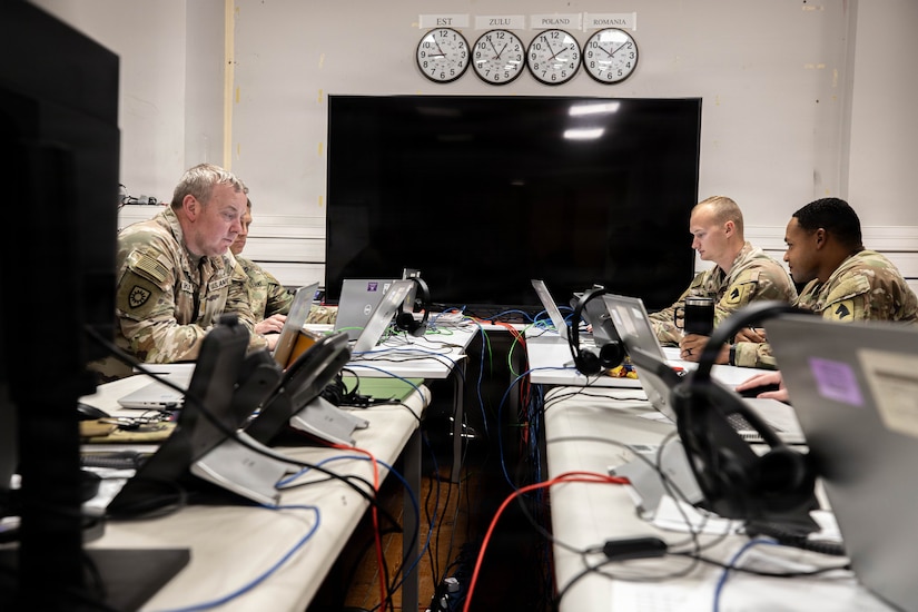 U.S. Army Kentucky National Guard Soldiers review Fire support plans from the 52nd Air Defense Artillery Brigade in the “FIRES cell”, the tactical hub for precision lethality during Avenger Triad 25, Oct. 30, 2025, Camp Kosciuszko, Poland.