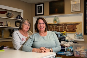 Two women smile for photo