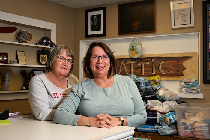 Two women smile for photo