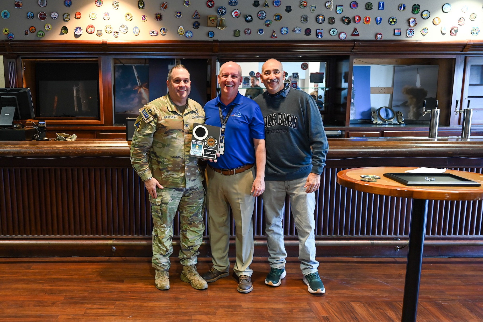 People pose for a photo.