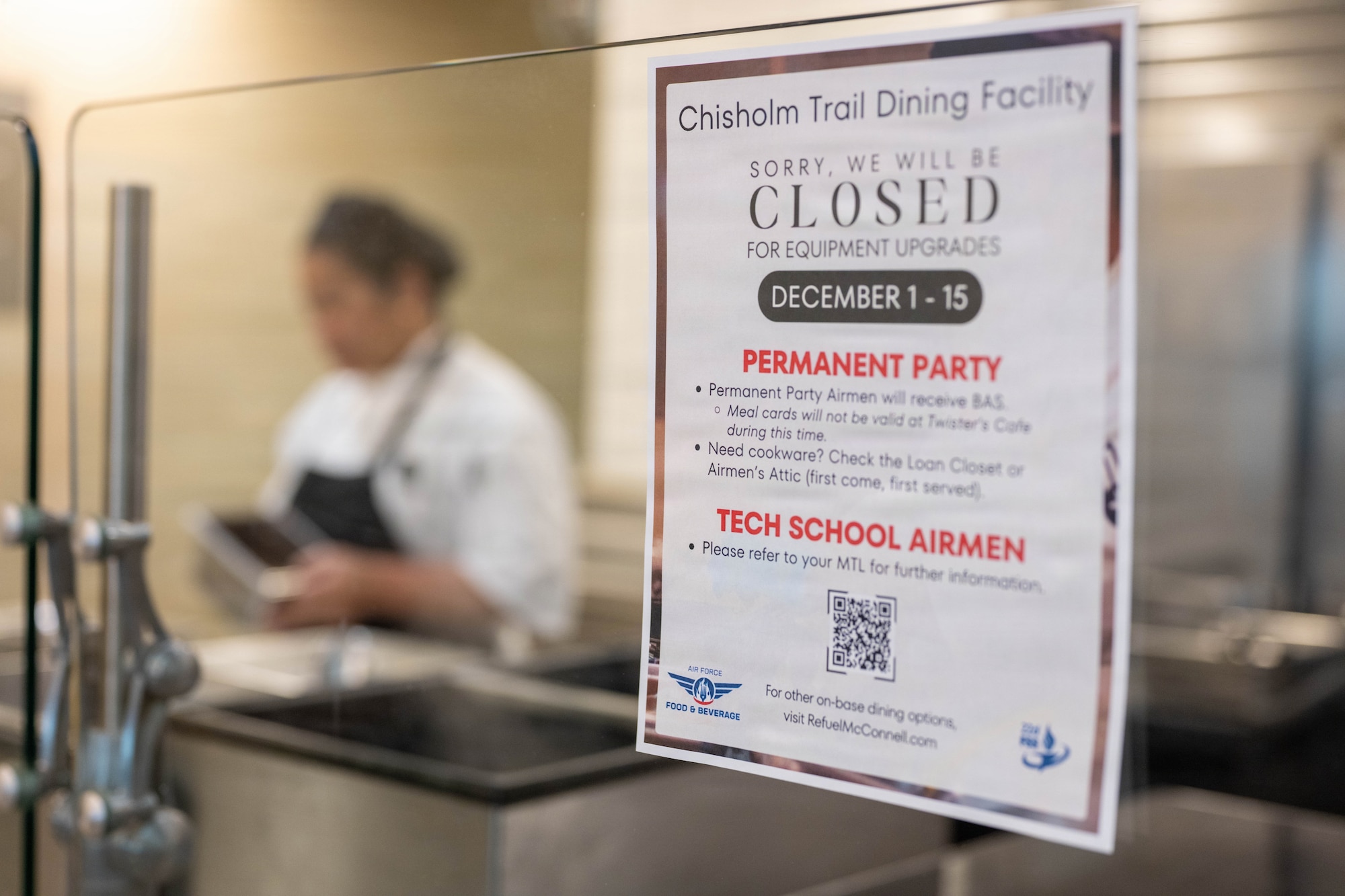 A flyer is attached to a food service station at McConnell Air Force Base, Kansas, Nov. 26, 2025. The flyer served as a way to inform Airmen that the Chisholm Trail Dining Facility will be closed from Dec. 1-15, 2025, for renovations. (U.S. Air Force photo by Airman 1st Class Patrick O’Neill)