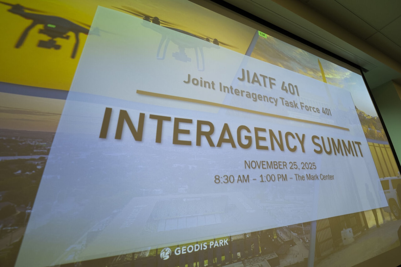 A screen reads JIATF 401 Joint Interagency Task Force 401 Interagency Summit, Nov. 25, 2025.