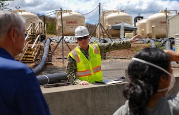 Cmdr. Benjamin Dunn, deputy for environment and remediation, Navy Closure Task Force-Red Hill (NCTF-RH),  provides information about the Red Hill Shaft granular activated carbon filtration system during a site visit with the Commission on Water Resource Management commissioners and Hawaii Department of Land and Natural Resources staffers during a site visit to the Red Hill Bulk Fuel Storage Facility (RHBFSF) in Honolulu, Sept. 30, 2025. Charged with the safe decommissioning of the RHBFSF, NCTF-RH was established by the Department of the Navy as a commitment to the community and the environment. NCTF-RH continues to engage with the people of Hawaii, regulatory agencies, and other stakeholders as it safely and deliberately decommissions the facility. (U.S. Navy photo by Mass Communication Specialist 1st Class Glenn Slaughter)