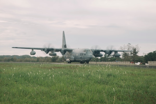 A U.S. Marine Corps KC-130J Super Hercules assigned to Marine Aerial Refueler Squadron (VMGR) 152, Marine Aircraft Group 12, 1st Marine Aircraft Wing, arrives to deliver hundreds of family food packs and personnel with the 15th Marine Expeditionary Unit, I Marine Expeditionary Force, and 3d Marine Expeditionary Brigade, III MEF, in support of foreign disaster relief operations at Virac, Philippines, Nov. 15, 2025.