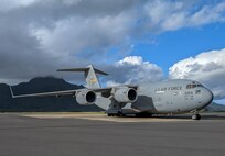 A photo of a C-17 Globemaster III parked at Pago Pago International Airport.