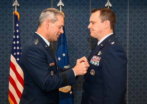 Service member awarded medals.
