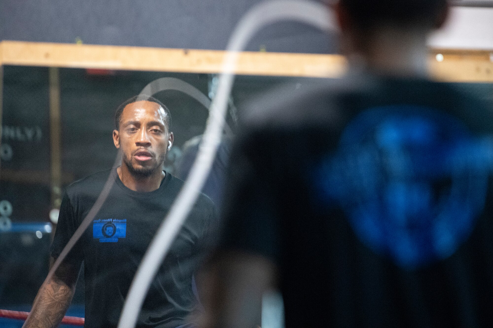 U.S. Air Force Senior Airman Craig Jeudy, Fifth Air Force technical support technician, jumps rope during a training session.