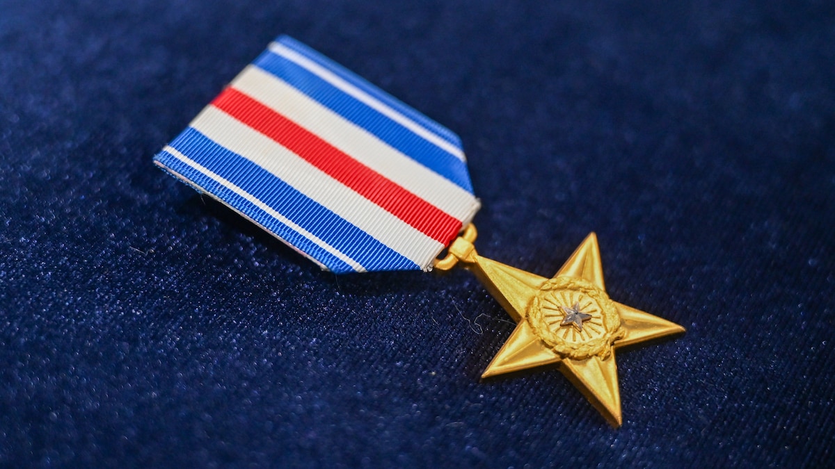 Service member awarded medals.