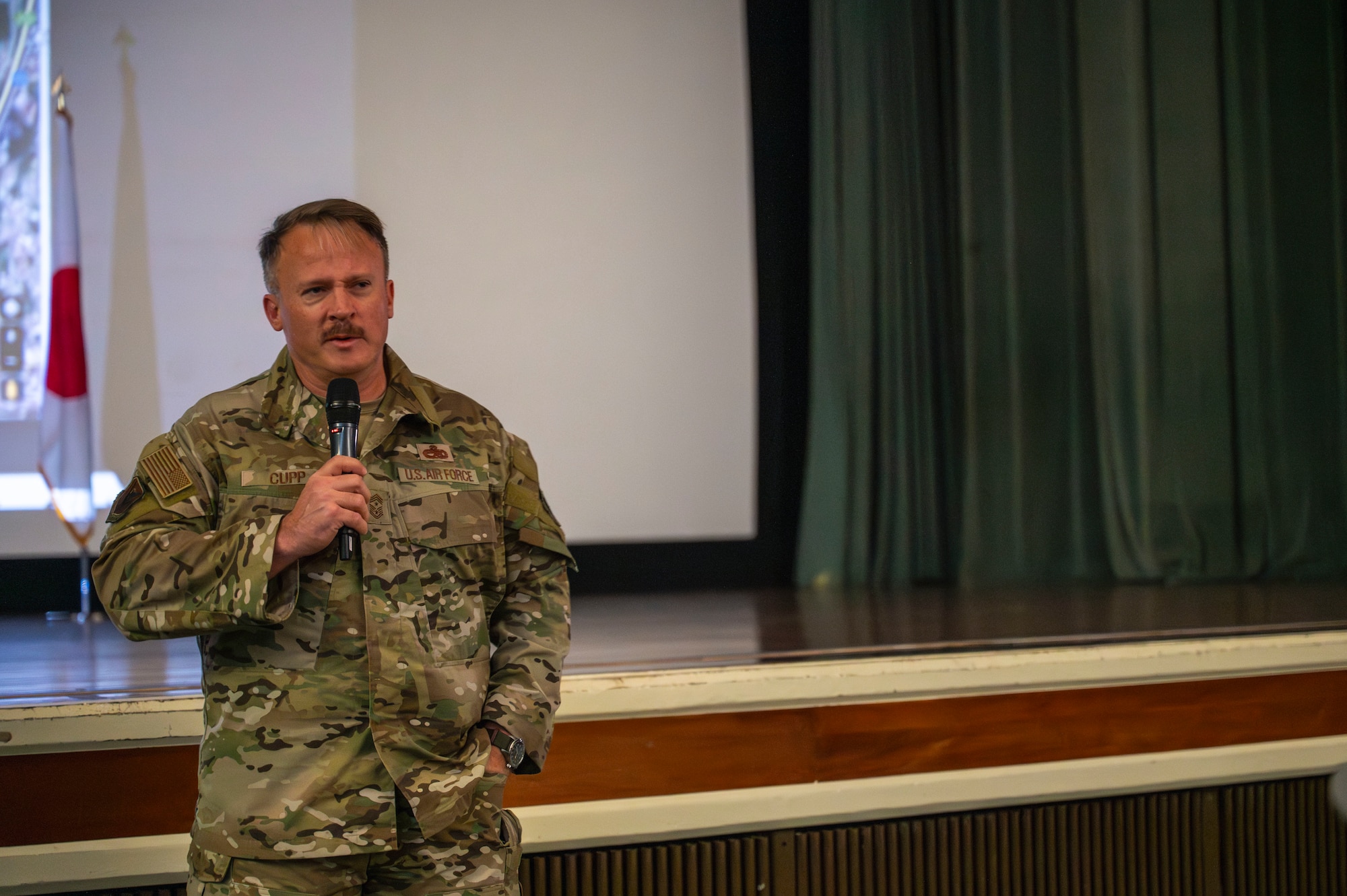 U.S. Air Force Chief Master Sgt. William Cupp, 18th Wing command chief, speaks to U.S. service members prior to the Norwegian Foot March at Kadena Air Base, Japan, Nov. 22, 2025.