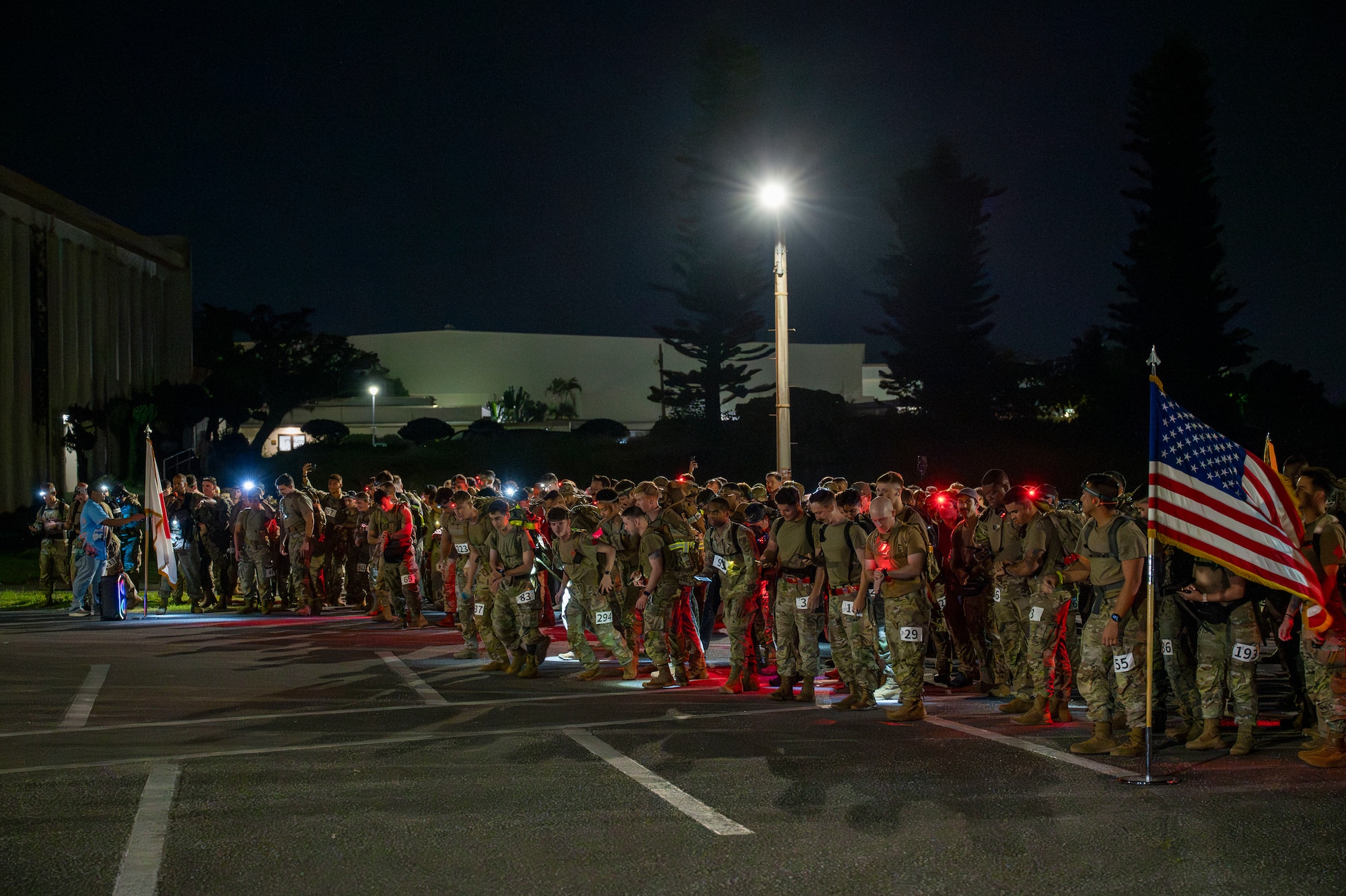 U.S. Air Force service members begin the Norwegian Foot March on Kadena Air Base, Japan, Nov 22, 2025.