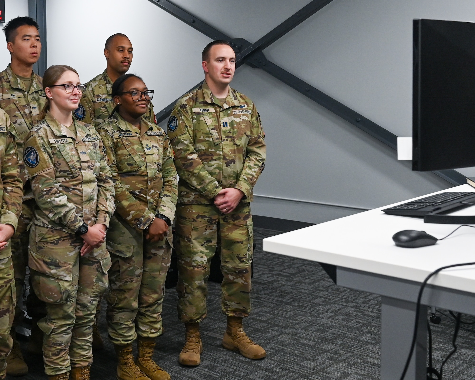 U.S. Space Force Capt. Ryan Weber, 18th Space Defense Squadron mission director, speaks with U.S. President Donald J. Trump during a virtual meeting.