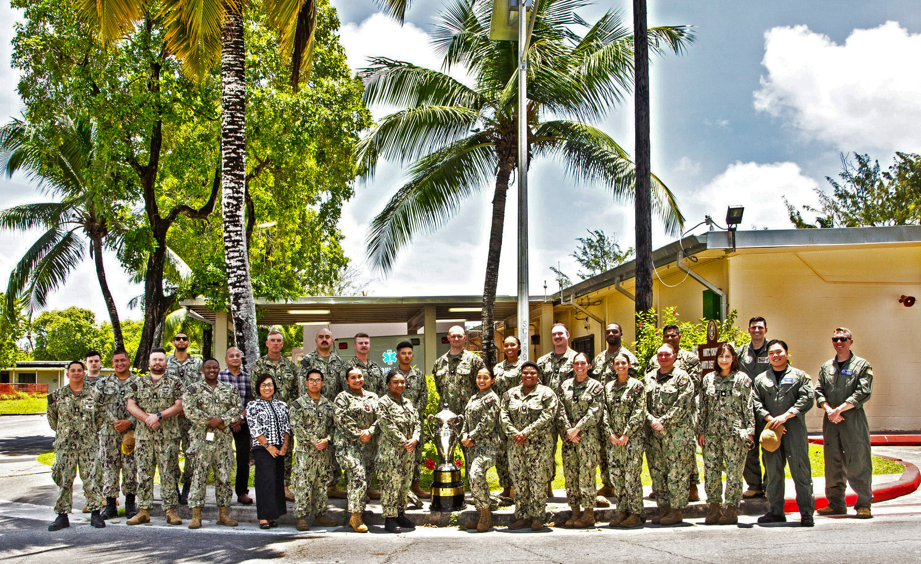 DIEGO GARCIA, British Indian Ocean Territory (Oct. 3, 2025) — Sailors and civilian staff assigned to U.S. Naval Hospital (USNH) Yokosuka’s Branch Health Clinic (BHC) Diego Garcia pose for a group photo. (U.S. Navy photo by USNMRTU Diego Garcia)