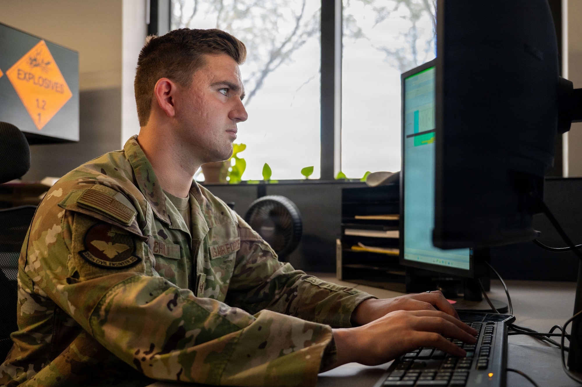 U.S. Air Force Staff Sgt. Joshua Schul, 355th Civil Engineer Squadron unit deployment manager, poses for an official photo at Davis-Monthan Air Force Base, Arizona, Sept. 25, 2025. As UDM Schul ensured Airmen on station and down-range were prepared for deployment. (U.S. Air Force photo by Senior Airman Jasmyne Bridgers-Matos)