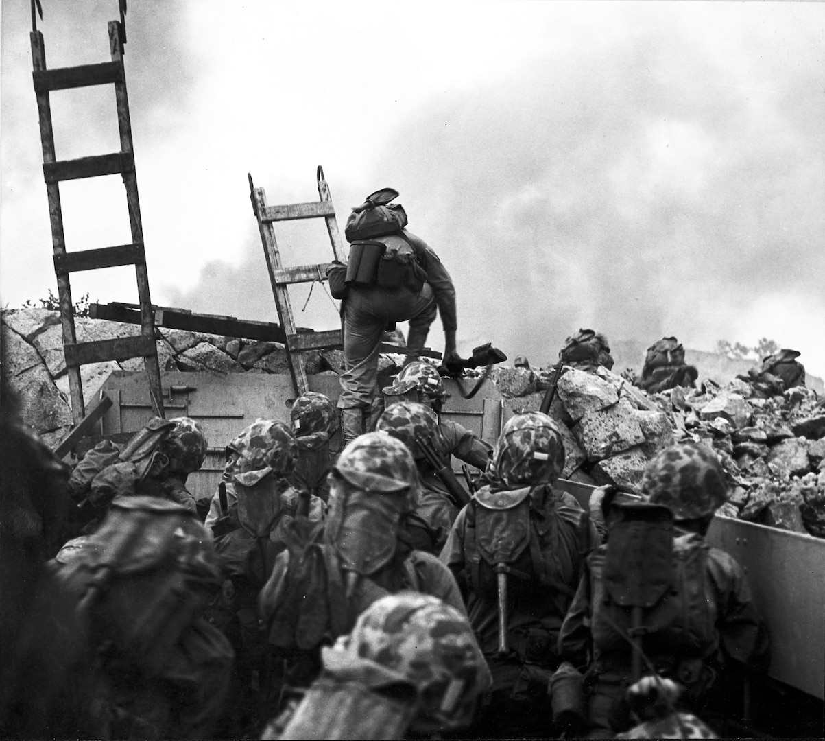 As against “The Shores of Tripoli” in the Marines Hymn, Leathernecks use scaling ladders to storm ashore at Inchon in an Amphibious invasion, September 15, 1950. It was one of the fastest operations on record, perfectly timed, with waves of Marines almost stumbling over preceding ones. The attack was so swift that casualties were surprisingly low.