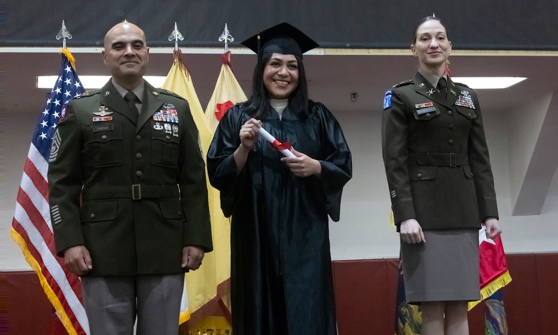 U.S. Marine Corps Sgt. Stephanie Enrriquez, an administration specialist with U.S. Marine Corps Forces Korea and a native of Texas, poses for a photo during a graduation ceremony on U.S. Army Garrison Humphreys, South Korea, Sept. 26, 2025. The Camp Humphreys Army Education Center hosted the Joint College Recognition Ceremony to congratulate service members and civilians on their completion of college programs. MARFORK is the U.S. Marine Corps' service component for United States Forces Korea and United Nations Command. (U.S. Marine Corps Photo by Cpl. Simon Saravia)