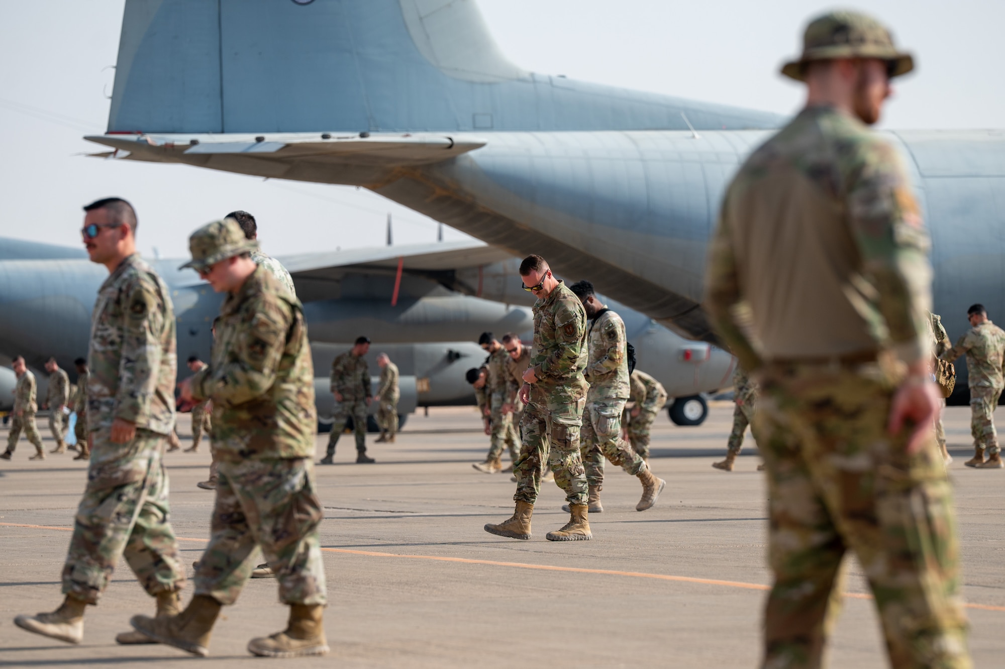 U.S. Airmen perform a foreign object debris walk