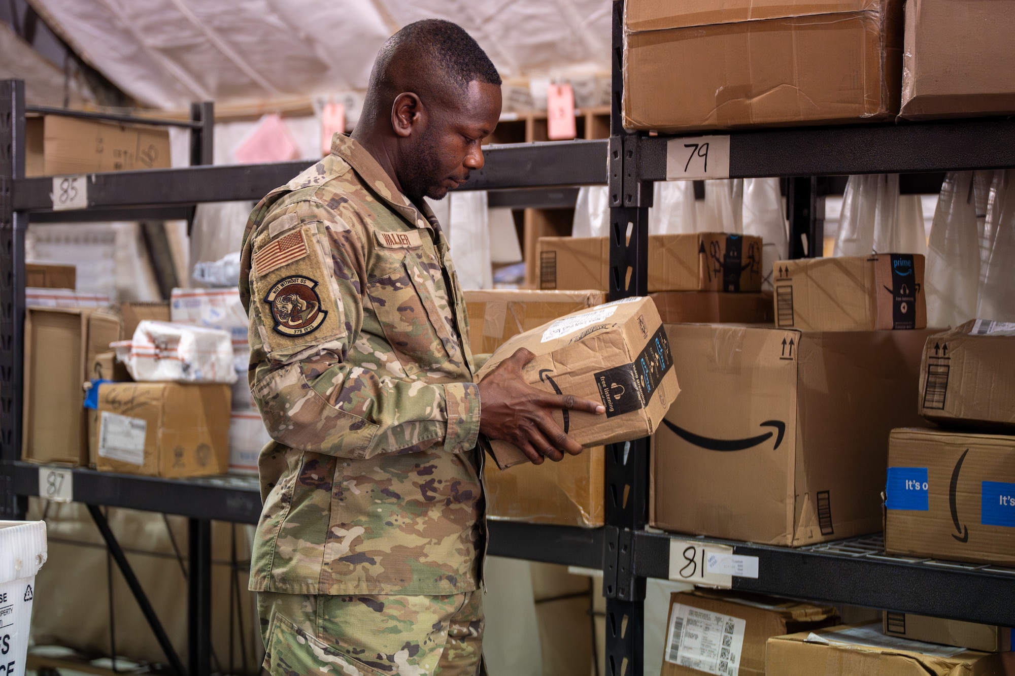 U.S. Airman verifies shipping information