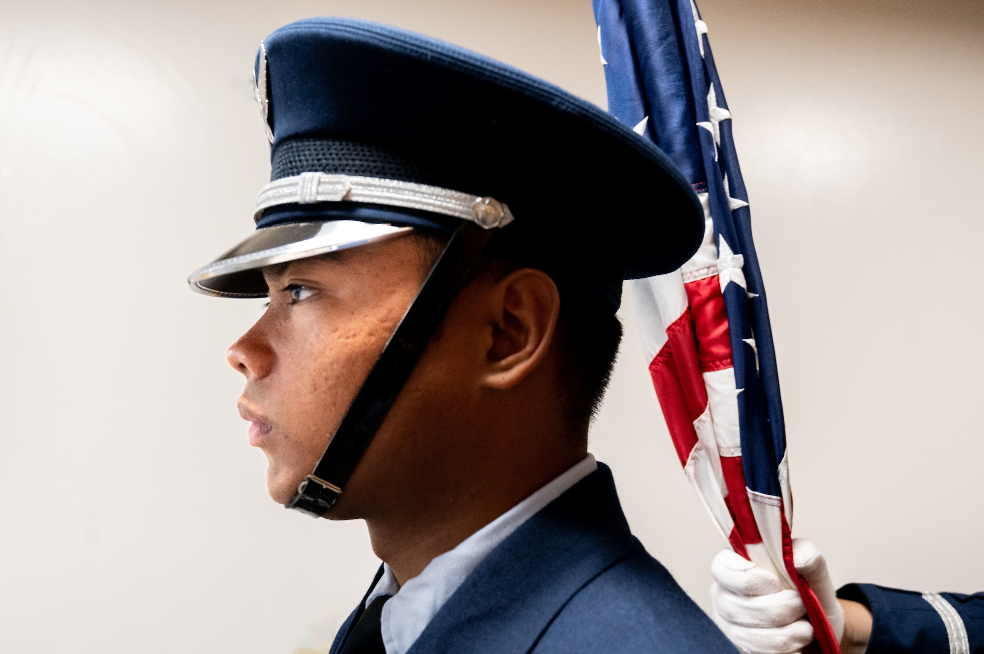 A U.S. Air Force honor guardsman assigned to the 6th Force Support Squadron prepares for the Gold Star Mother’s and Family Day event at MacDill Air Force Base, Florida, Sept. 28, 2025. The event was held in remembrance of fallen service members and provided a forum for family members to speak on behalf of their loved ones. (U.S. Air Force photo by Senior Airman Sterling Sutton)