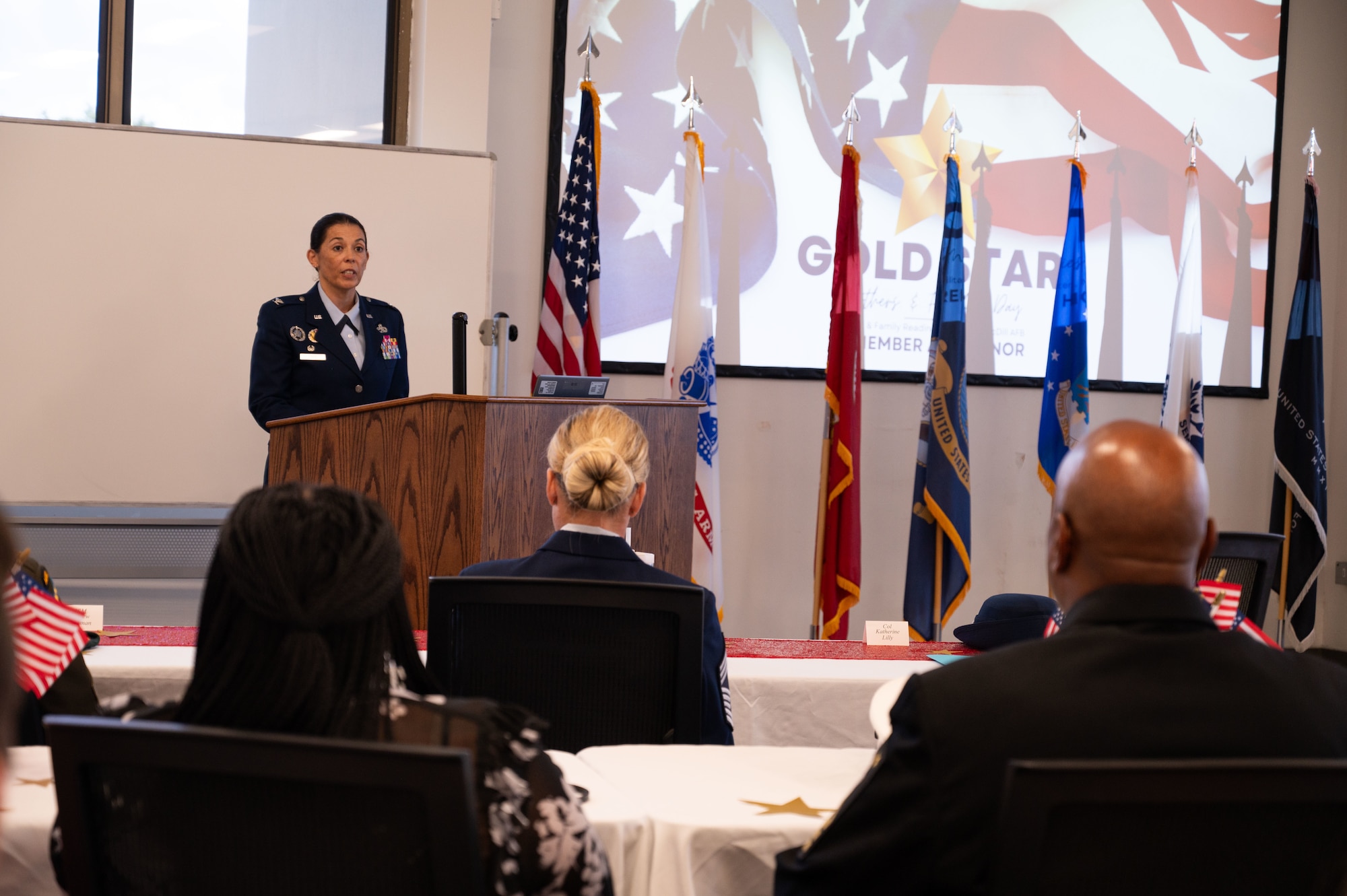 U.S. Air Force Col. Katherine Lilly, 6th Maintenance Group commander, provides opening remarks during the Gold Star Mother’s and Family Day event at MacDill Air Force Base, Florida, Sept. 28, 2025. The event was held in remembrance of fallen service members and provided a forum for family members to speak on behalf of their loved ones. (U.S. Air Force photo by Senior Airman Sterling Sutton)