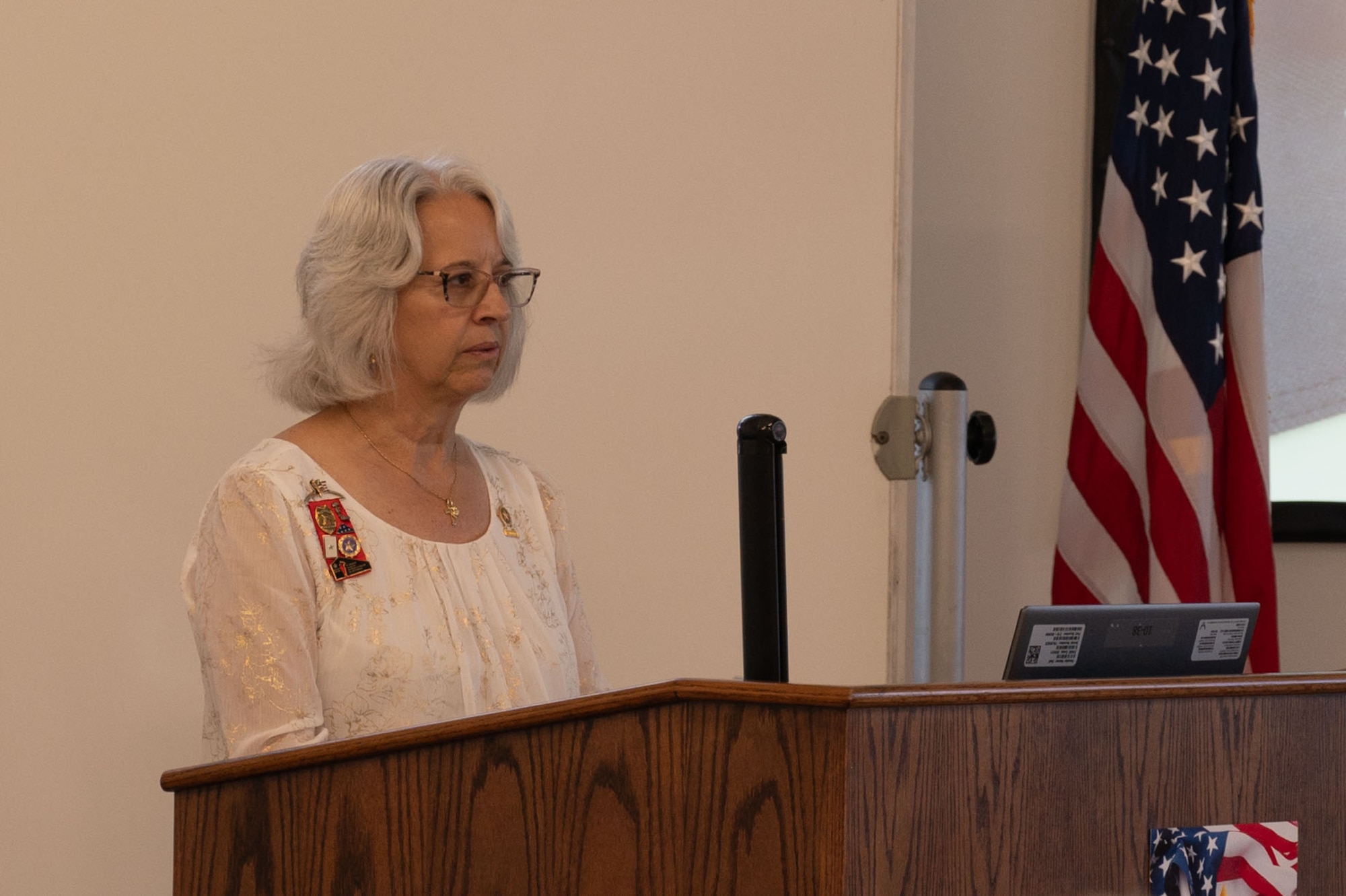 Michele Cary, a speaker at the Gold Star Mother’s and Family Day event, shares a story about her son at MacDill Air Force Base, Florida, Sept. 28, 2025. The event was held in remembrance of fallen service members and provided a forum for family members to speak on behalf of their loved ones. (U.S. Air Force photo by Senior Airman Sterling Sutton)