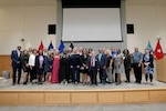 Retirees pose for picture.