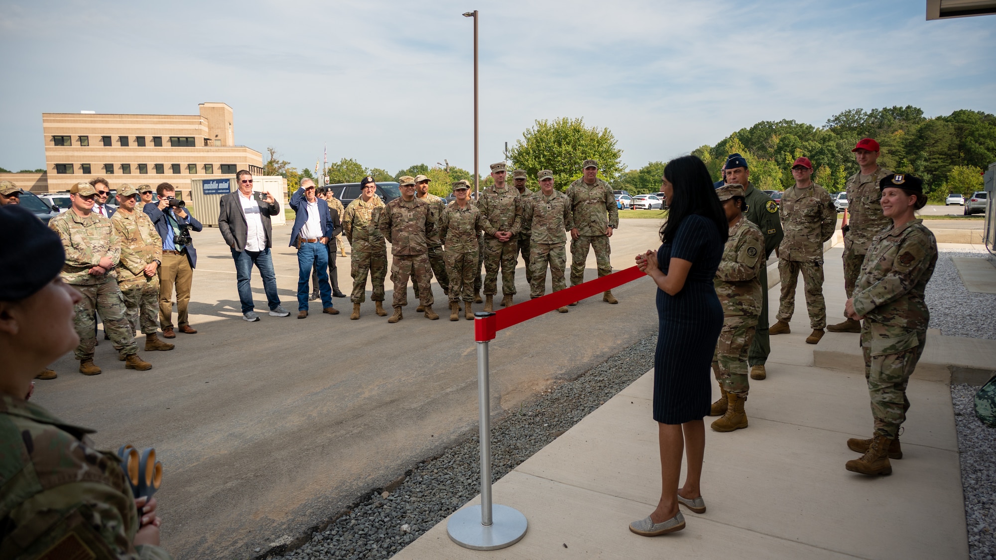 Maryland Lt. Gov. Aruna Miller speaks alongside Maryland Army National Guard Maj. Gen. Janeen L. Birckhead, Adjutant General for Maryland, Maryland Air National Guard Brig. Gen. Drew Dougherty, Assistant Adjutant General - Air, and Maryland Air National Guard Capt. Allison Fleming, commander of the 175th Security Forces Squadron, during a ribbon-cutting ceremony for the new small-arms range at Warfield Air National Guard Base at Martin State Airport, September 23, 2025.