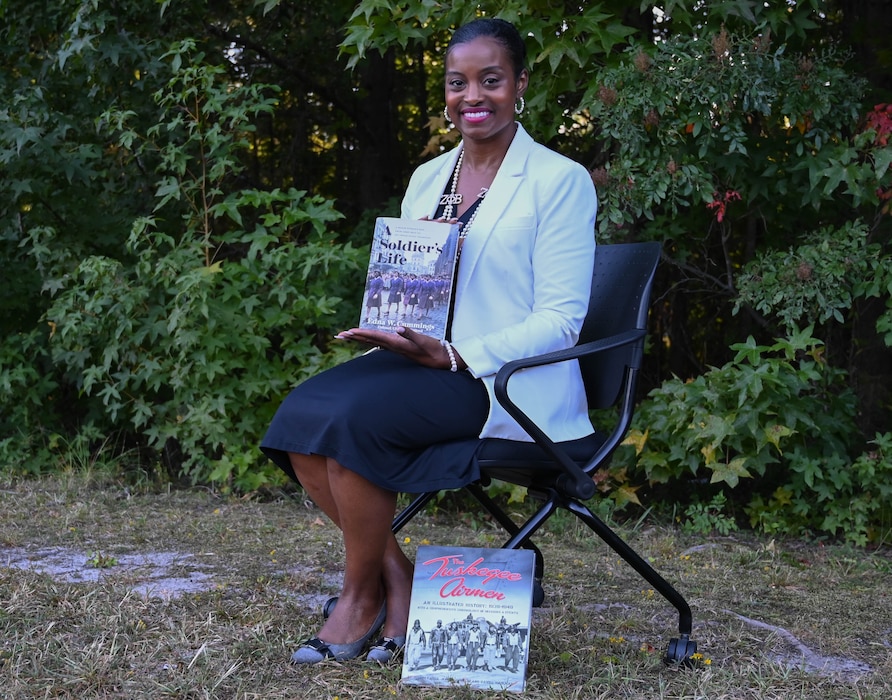 A woman poses for a photo.